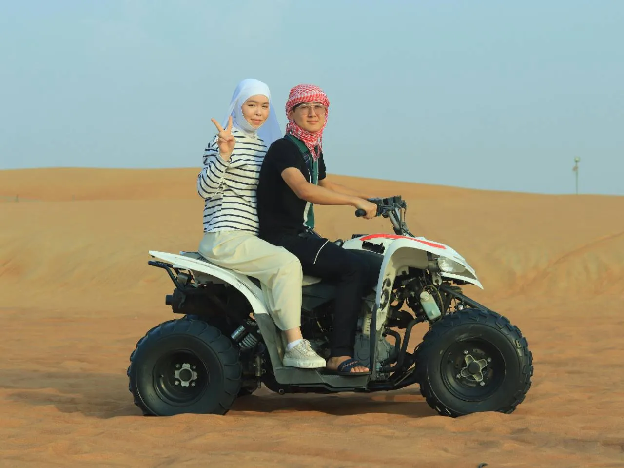Double Quad Bike Ride Across the Golden Sands of Dubai.